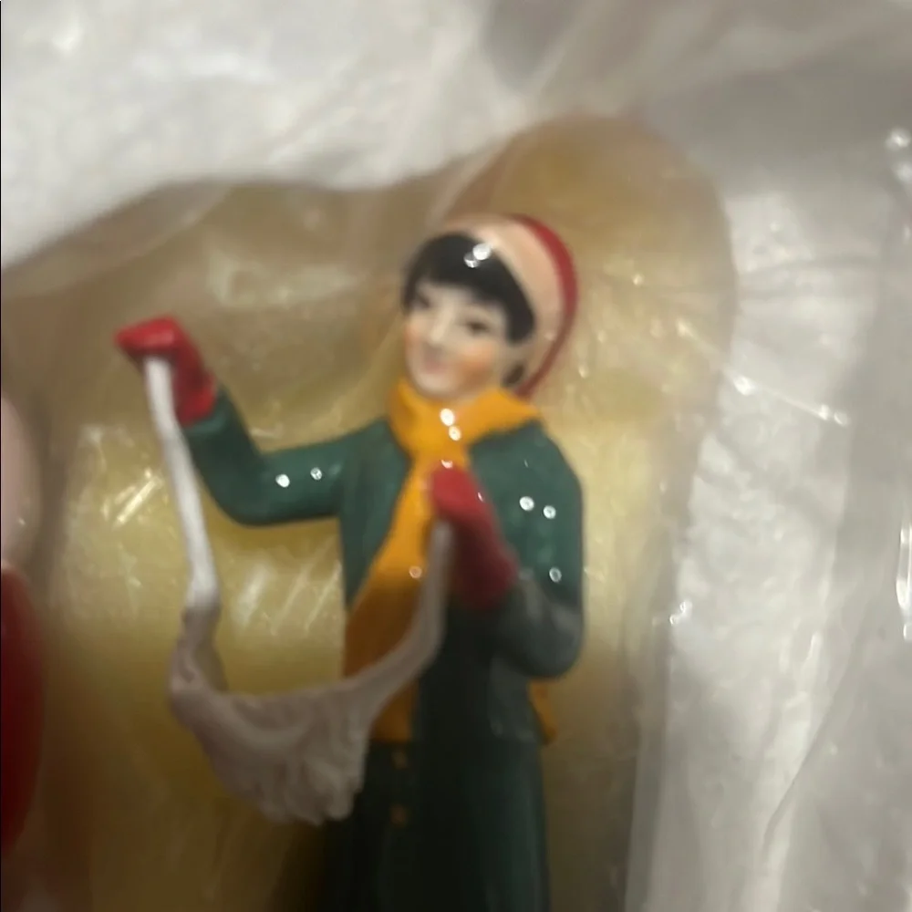 Department 56 Snow Village Christmas Lane Figurine. Dads Christmas tradition